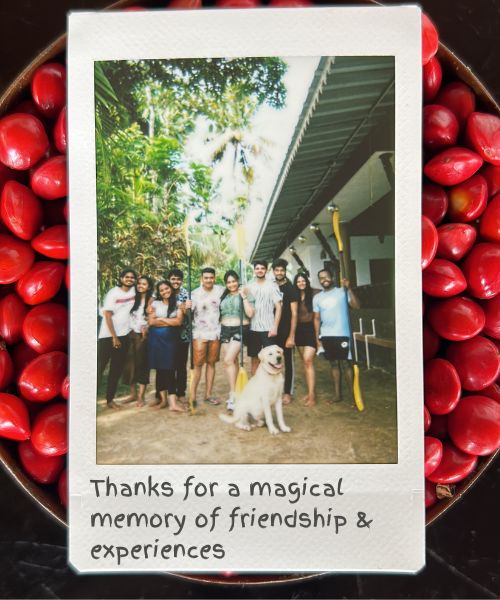 A polaroid photograph of tourists with a thank you note.